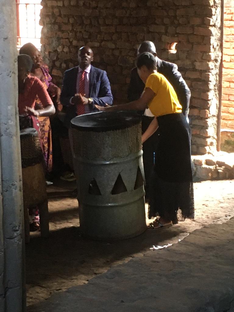 Improvising musical instruments with an empty bin in church right up by the North Kivu Congo border.